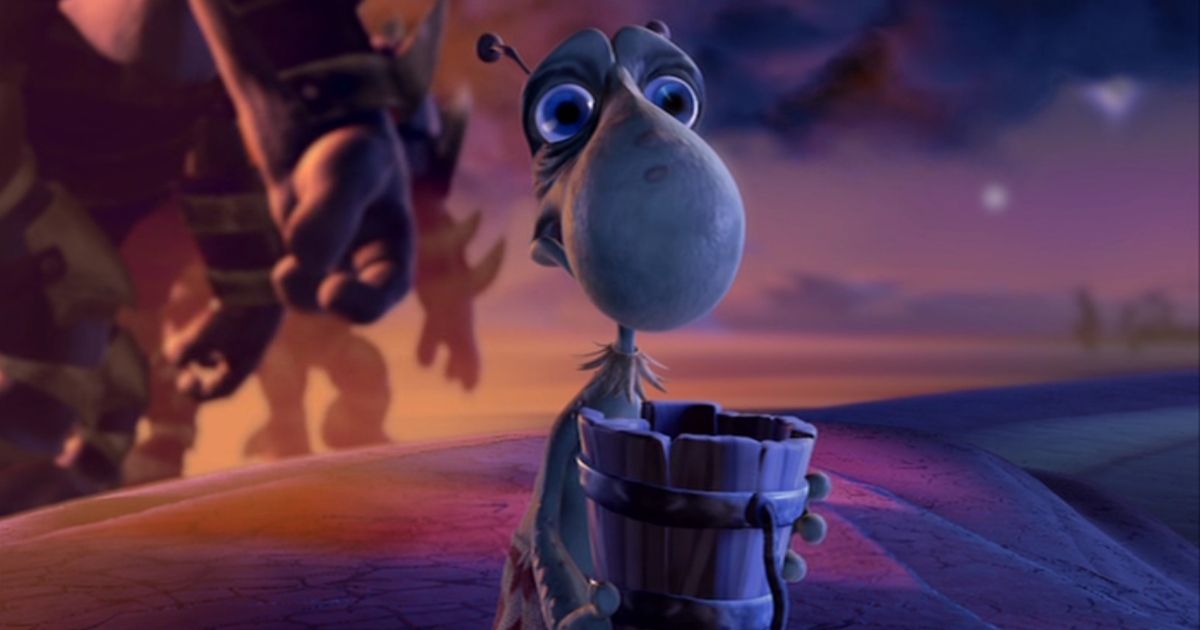 Meeper the alien with a wooden bucket in his hand