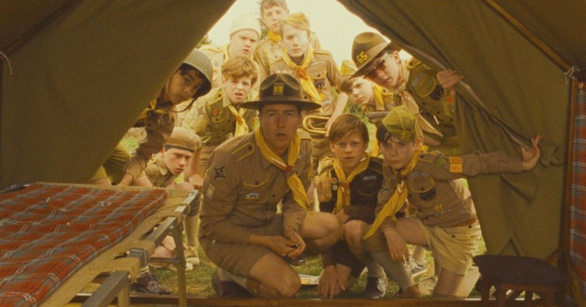 A group of campers look into a tent in Moonrise Kingdom