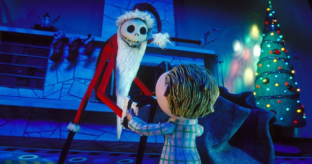 Jack Skellington dressed up as Santa Claus with a present in his hands delivering it to a child in The Nightmare Before Christmas