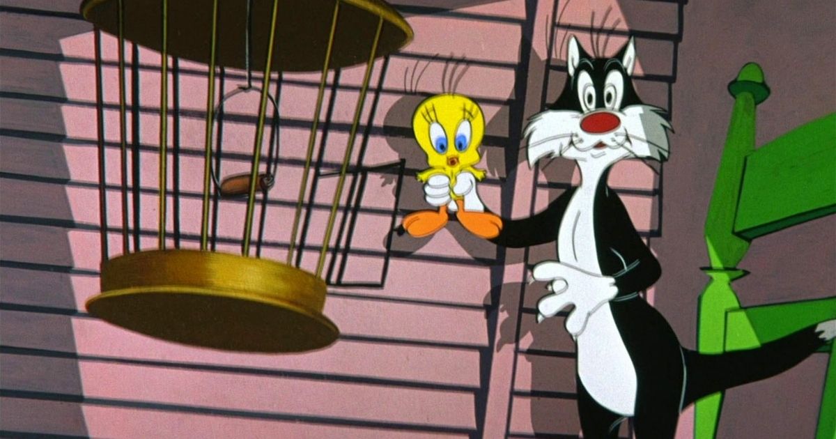 Sylvester caught red handed pulling Tweety out of the cage in Birds Anonymous