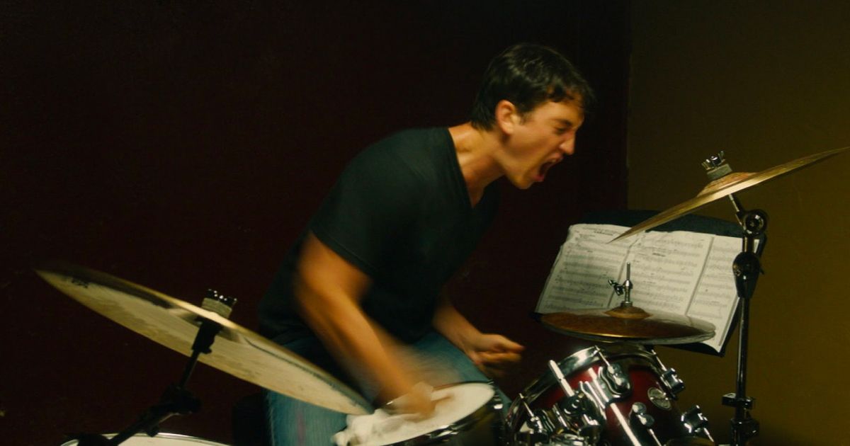 Miles Teller punches his drums, Whiplash (2013).