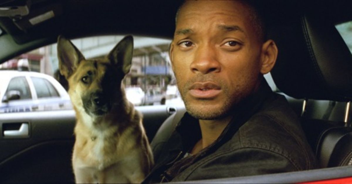 Will Smith in I Am Legend with a dog in the passenger seat of his car