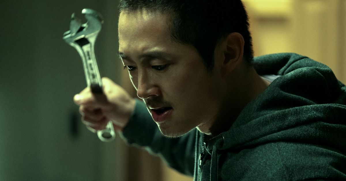 BEEF star Steven Yeun holds a wrench in Netflix series