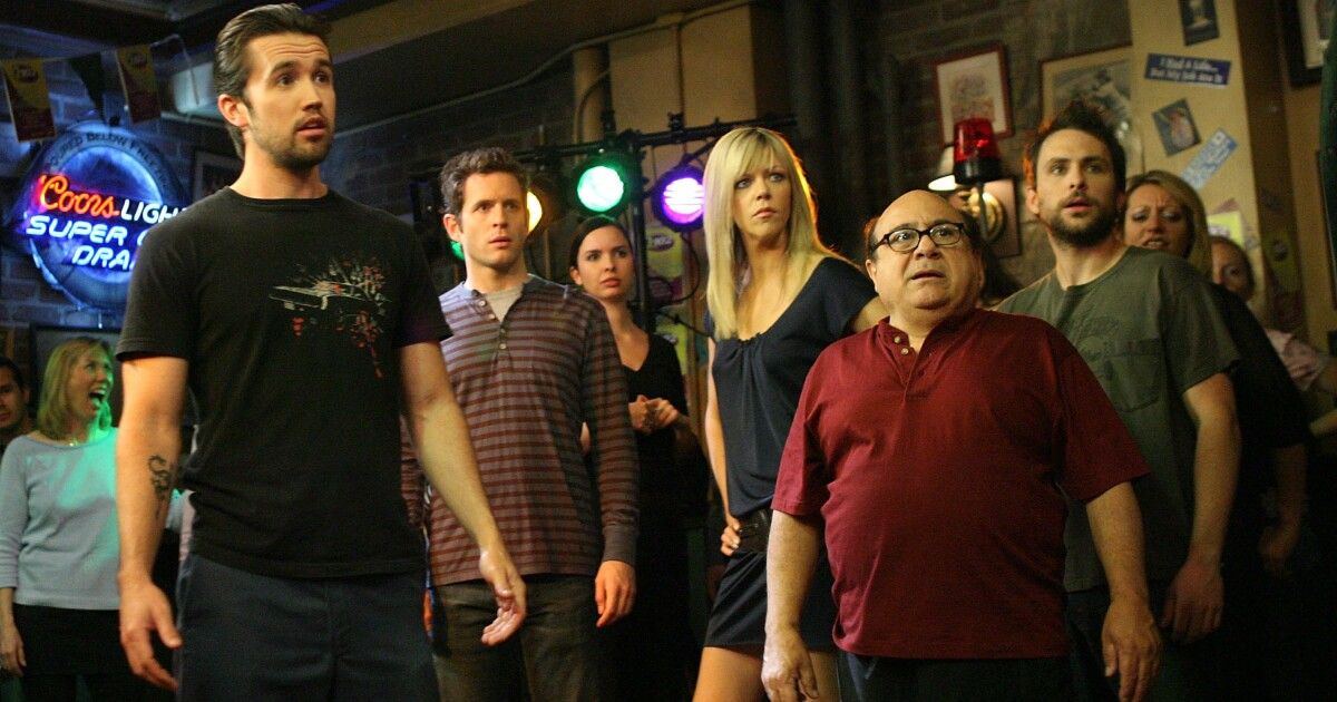 It's Always Sunny in Philadelphia cast looks shocked and disgusted while standing in Paddy's Pub together.