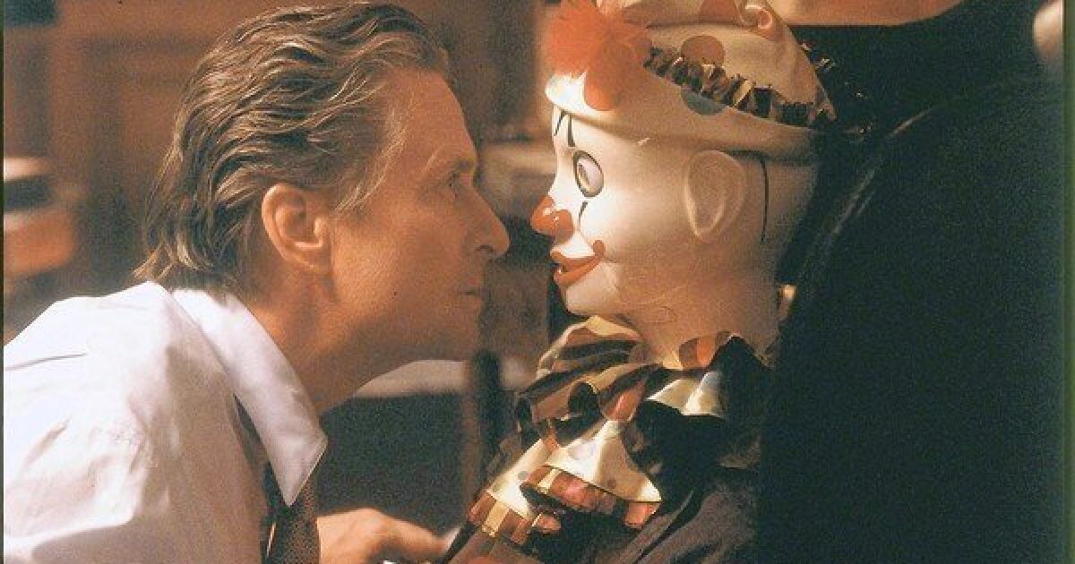 Michael Douglas and a clown doll in The Game