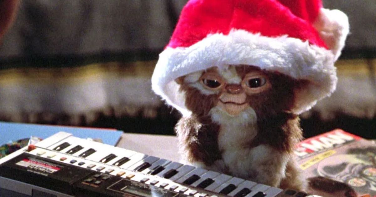 A mogwai wearing a Santa hat in Gremlins