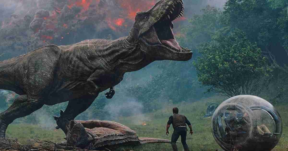 A T-rex roars on a burning island in Jurassic World