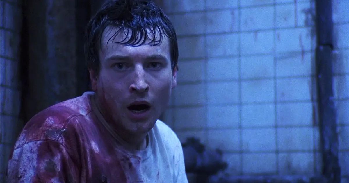 Whannell in Saw 
