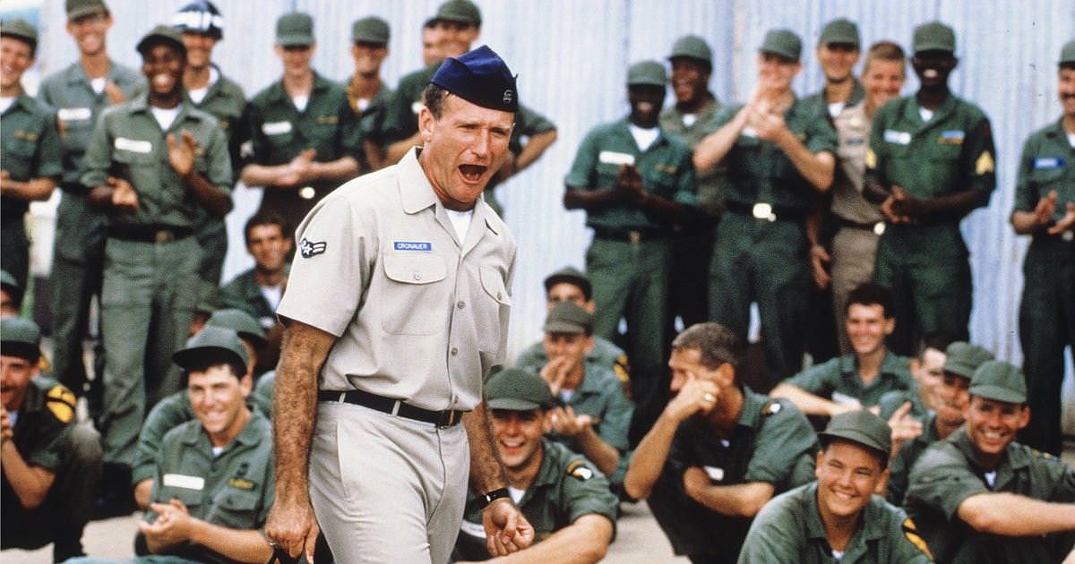 Robin Williams as Adrian Cronauer in Good Morning, Vietnam Vietnam War movies