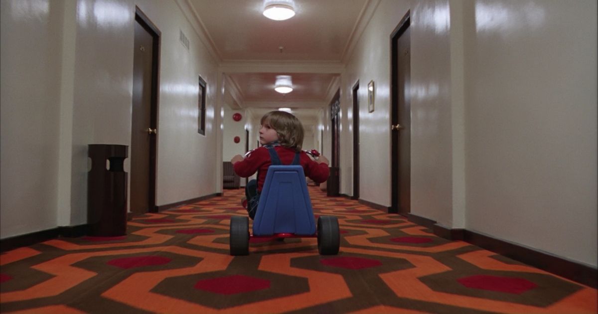 Danny rides the halls in The Shining