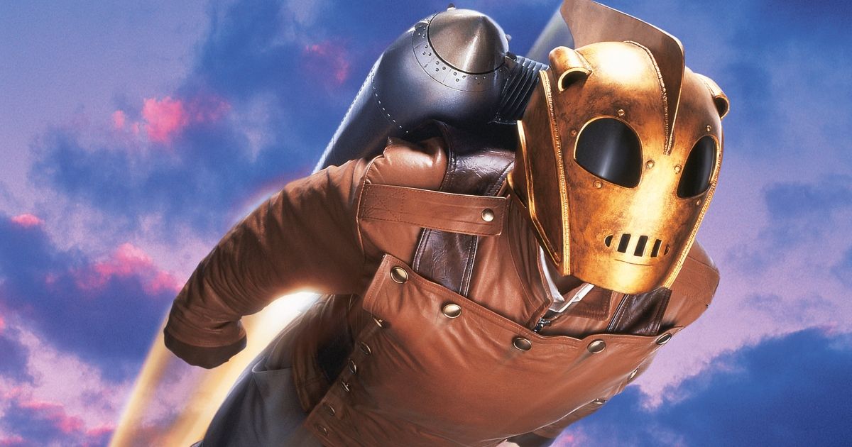 Rocketeer character flying through the sky with his iconic helmet and jetpack.