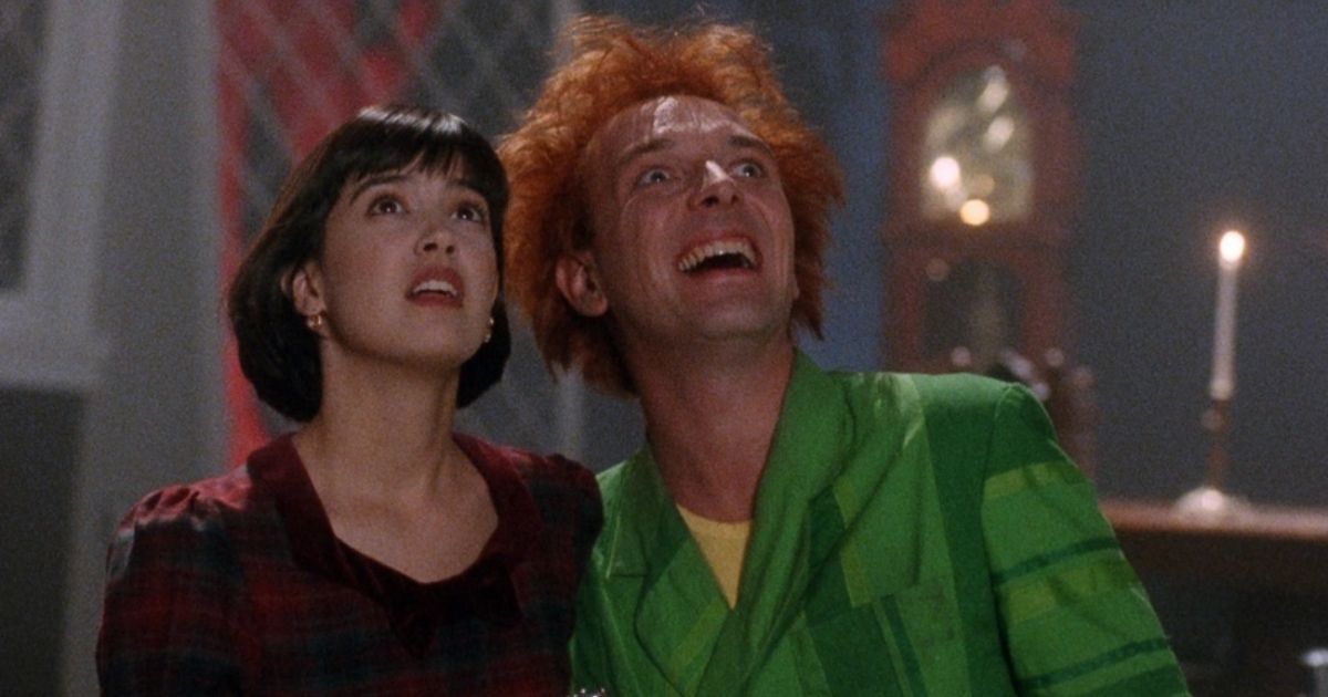 Phoebe Cates as Elizabeth Cronin and Rik Mayall as Drop Dead Fred in Drop Dead Fred (1991)