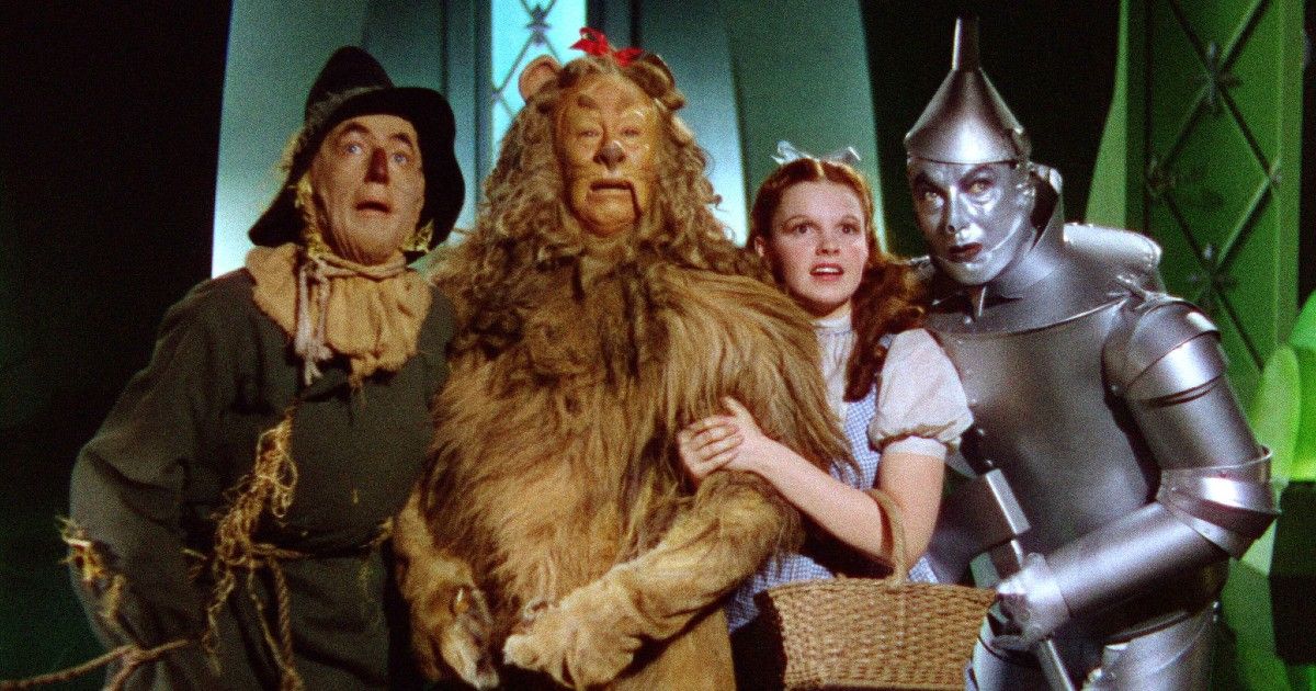 The Scarecrow, Cowardly Lion, Dorothy, and the Tin Man in The Wizard of Oz