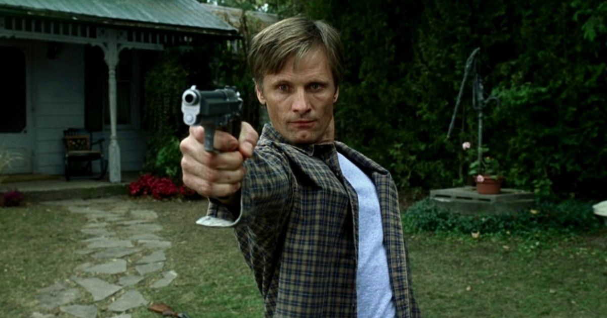 Viggo pointing a gun in A History of Violence