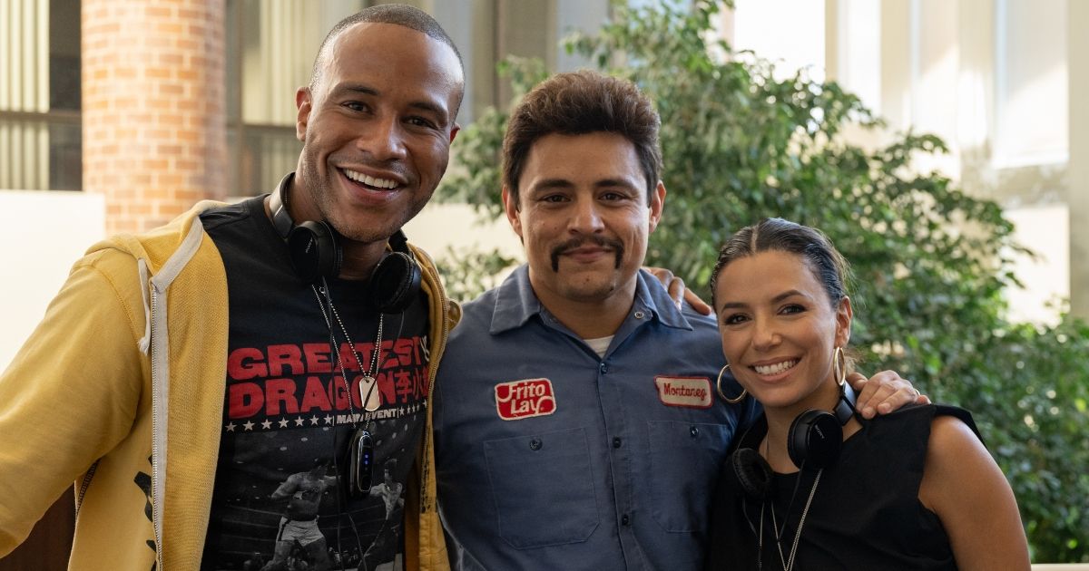 DeVon Franklin, Jesse Garcia, and Eva Longoria on set of Flamin Hot