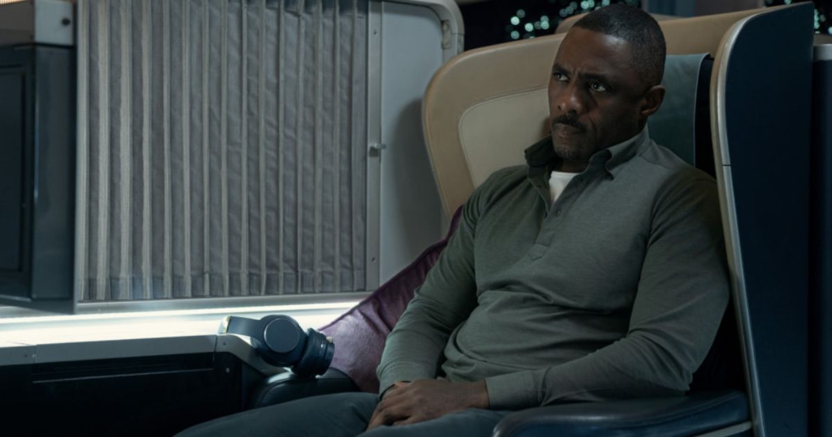Idris Elba on a plane in Hijack