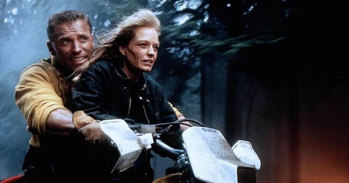 The lead characters on a motorcycle in Firestorm 