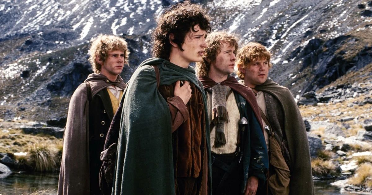 The Lord of the Rings: The Fellowship of the Ring hobbits standing together looking at something.