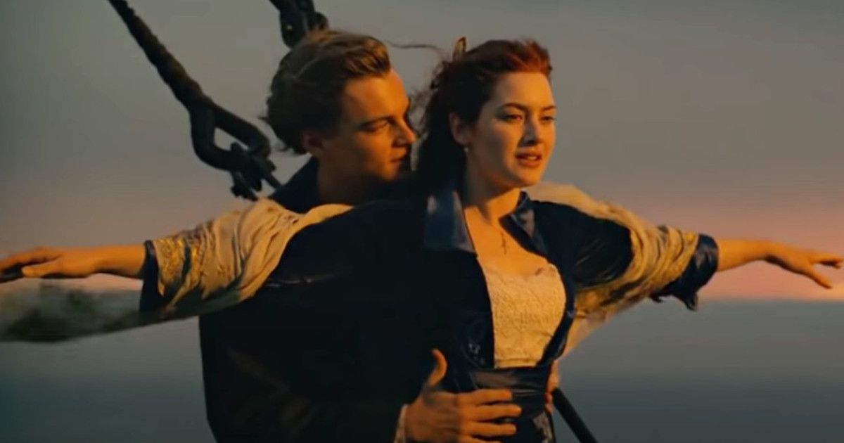 Leonardo DiCaprio as Jack and Kate Winslet as Rose on the deck in Titanic (1997).