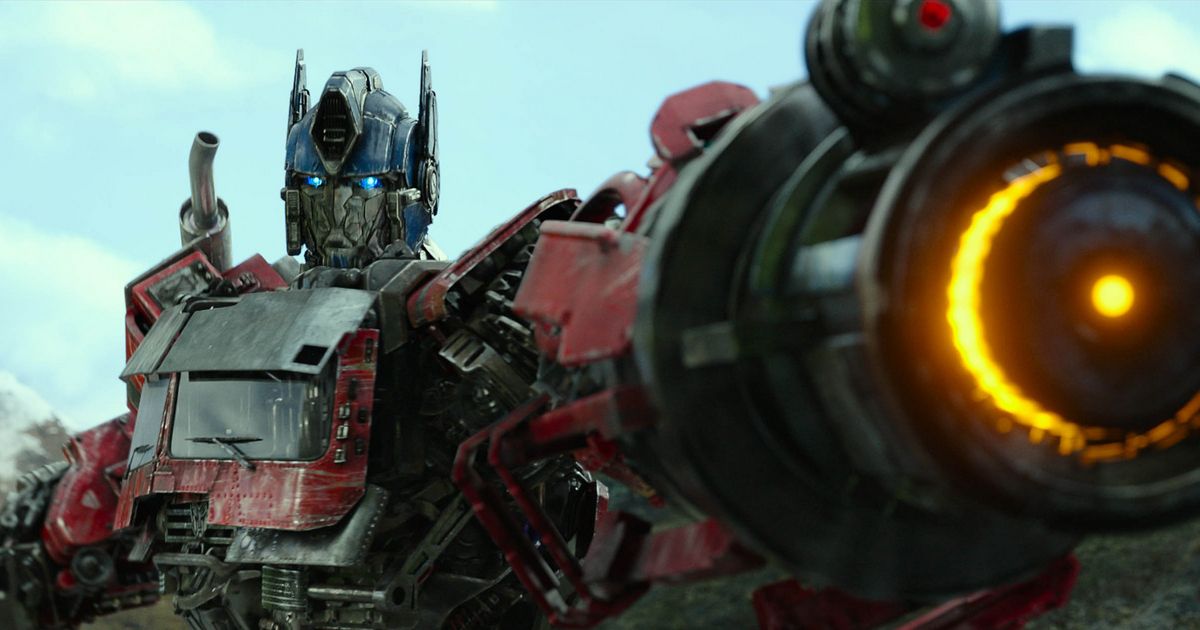 Optimus Prime aiming his cannon at something off-screen.