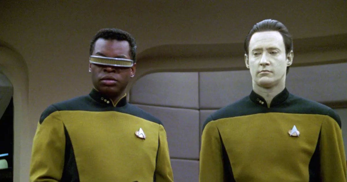 Data and Geordi standing side by side