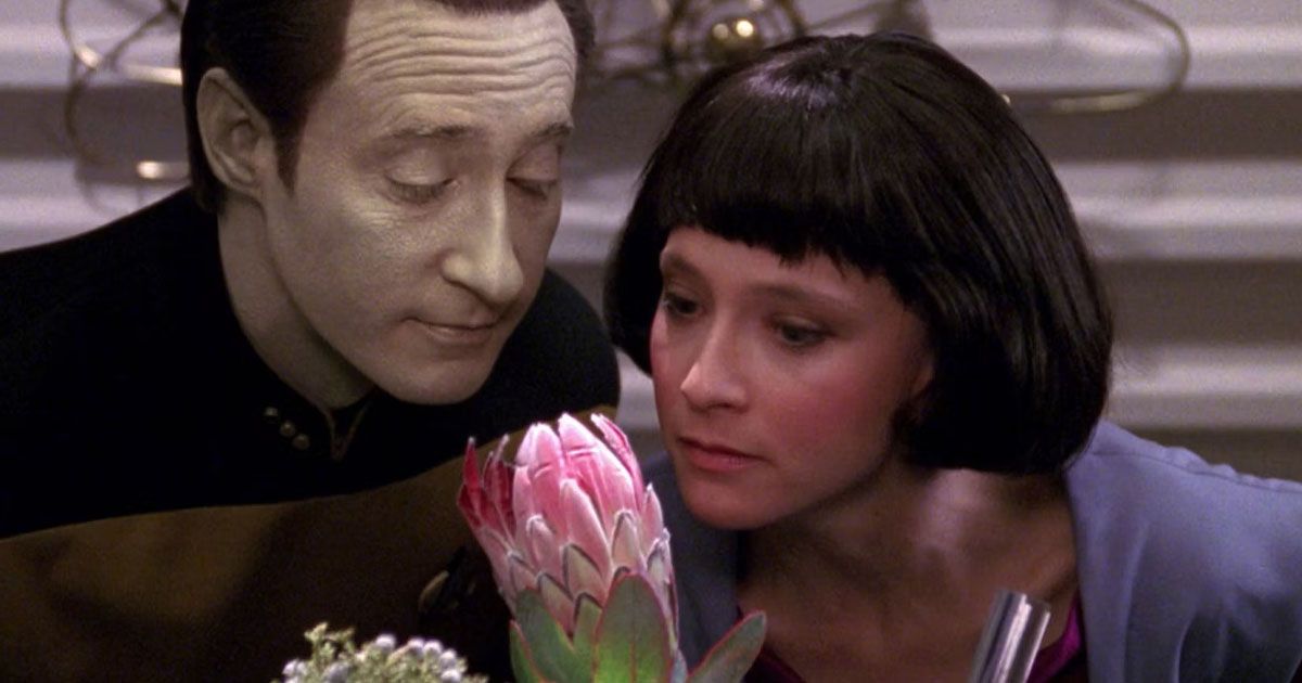 Data and Lal Sniffing a flower TNG