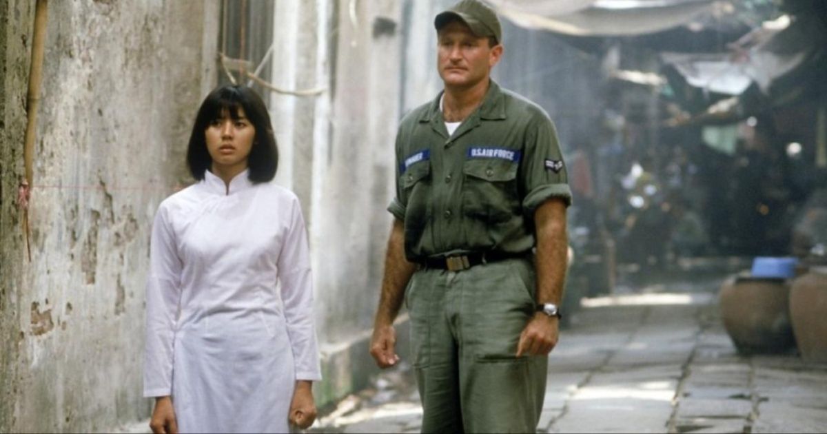 A Vietnamese woman stares over a destroyed village in Good Morning, Vietnam