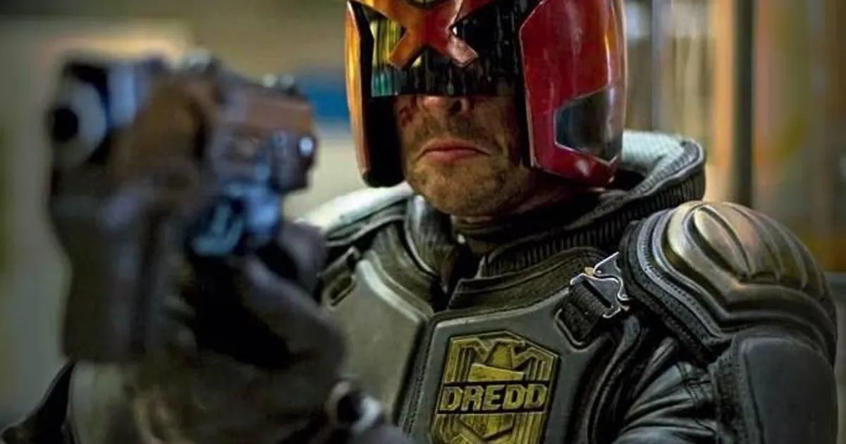 Judge Dredd holding a gun