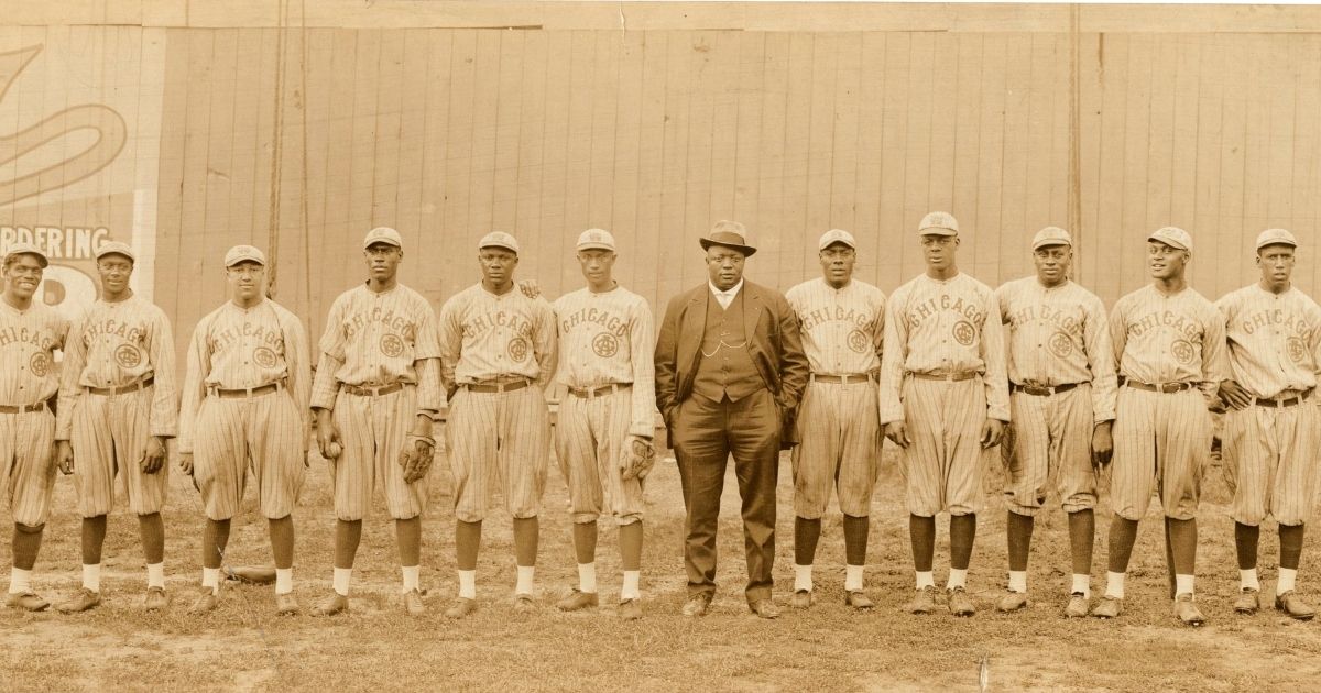 Rube Foster (center) managing the Chicago American Giants in 1916, from THE LEAGUE by Sam Pollard