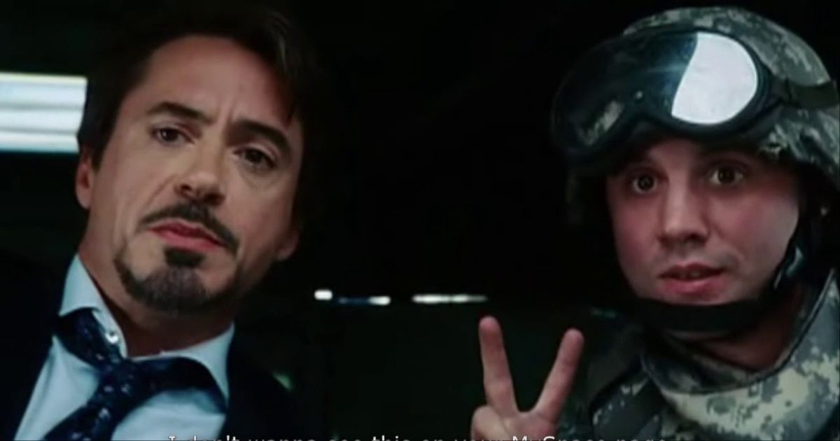 Tony Stark takes a selfie with a soldier in Iron Man