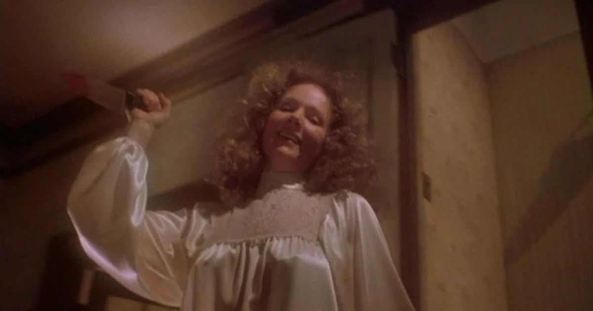 Piper Laurie holding knife in Carrie