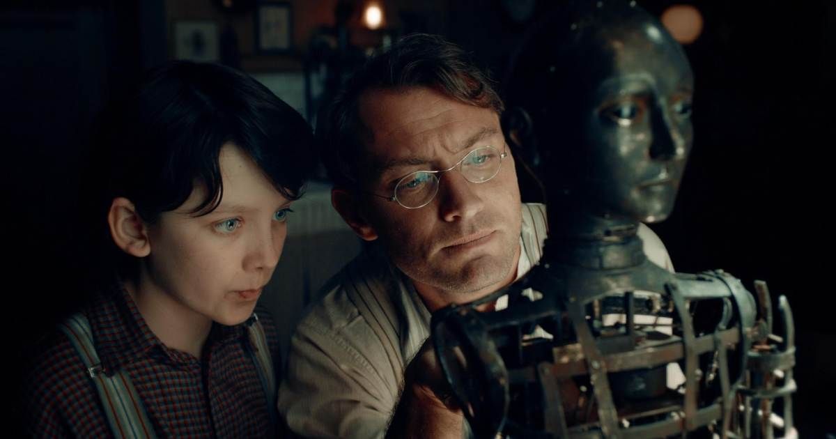 A man and child work on an automaton in Martin Scorsese's Hugo