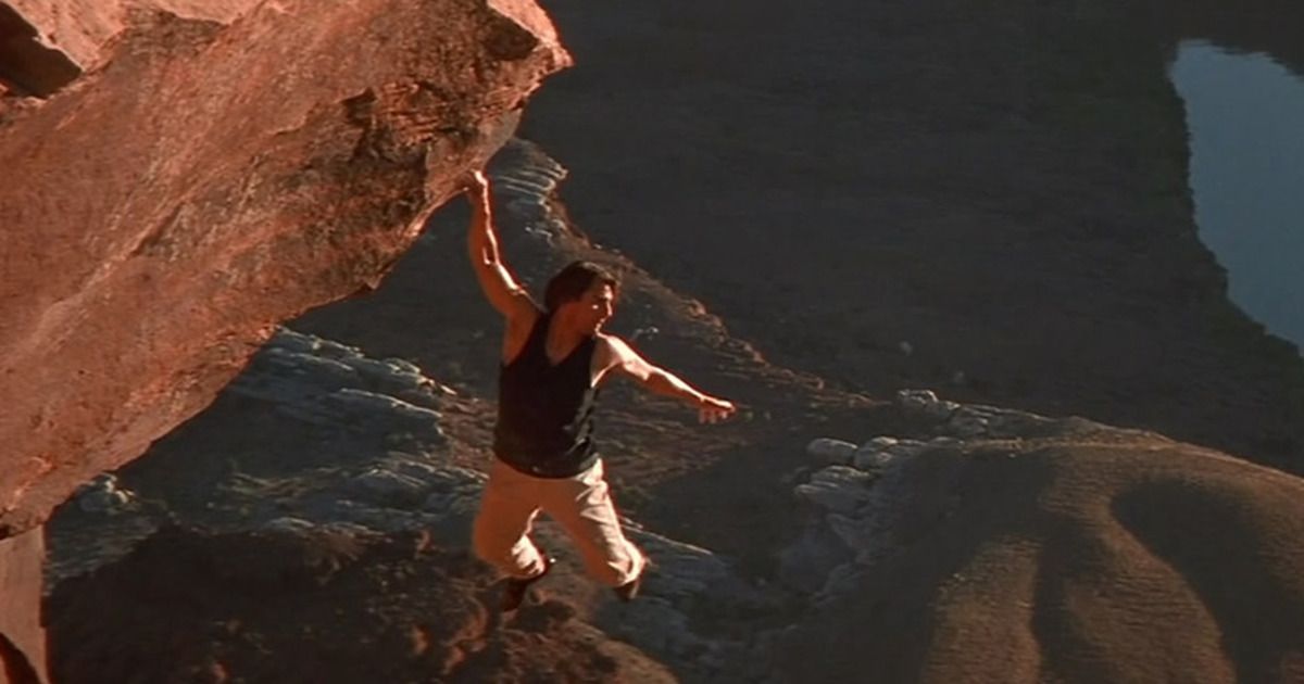 Ethan climbing the cliff