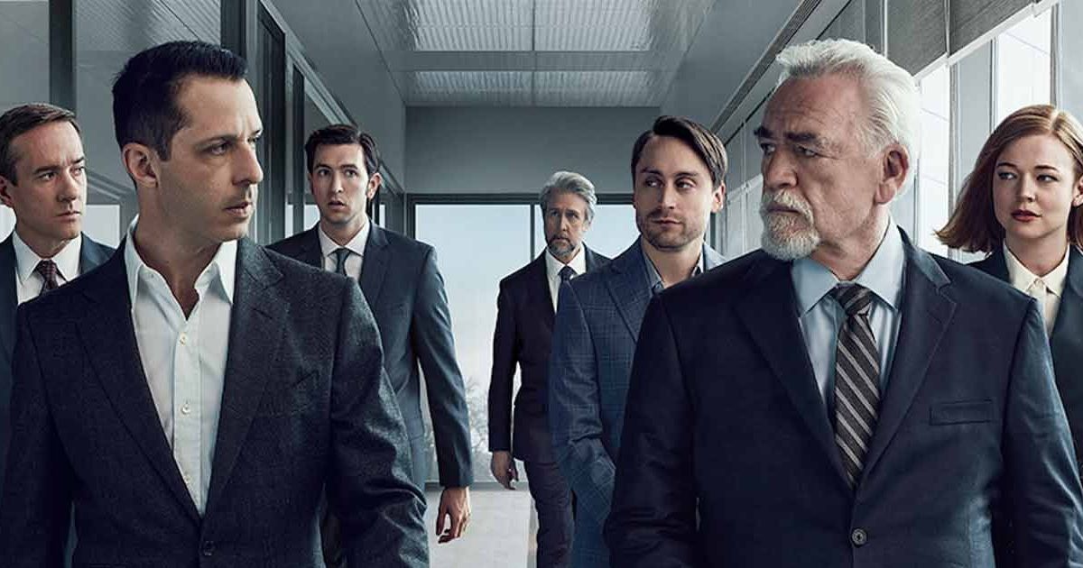 A promo image for Succession with Logan and Kendall leading others, staring one another down.