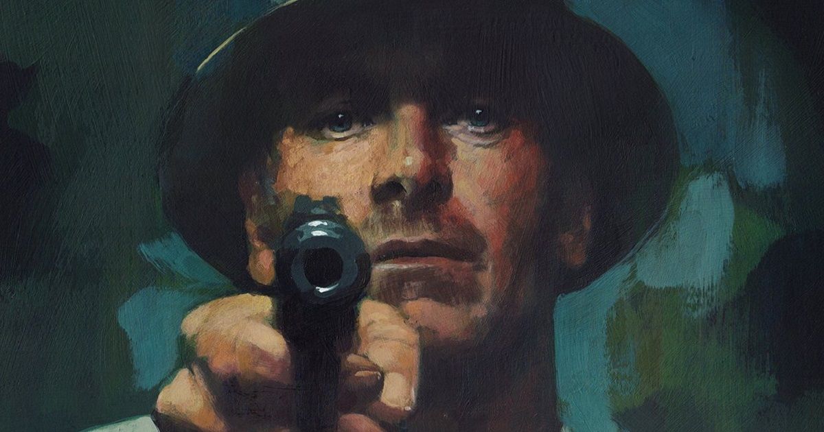 Michael Fassbender pointing a gun directly in front of him in a poster for The Killer, made to look like it was a painting. 