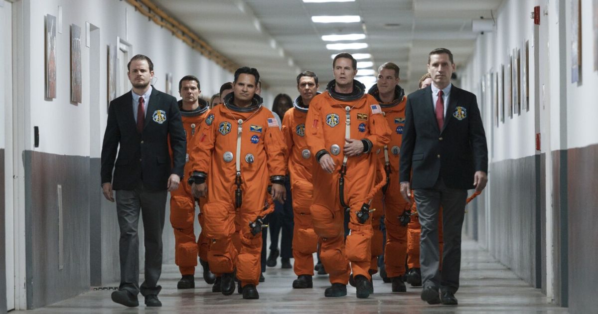 The Astronauts walk in the hall in A Million Miles Away