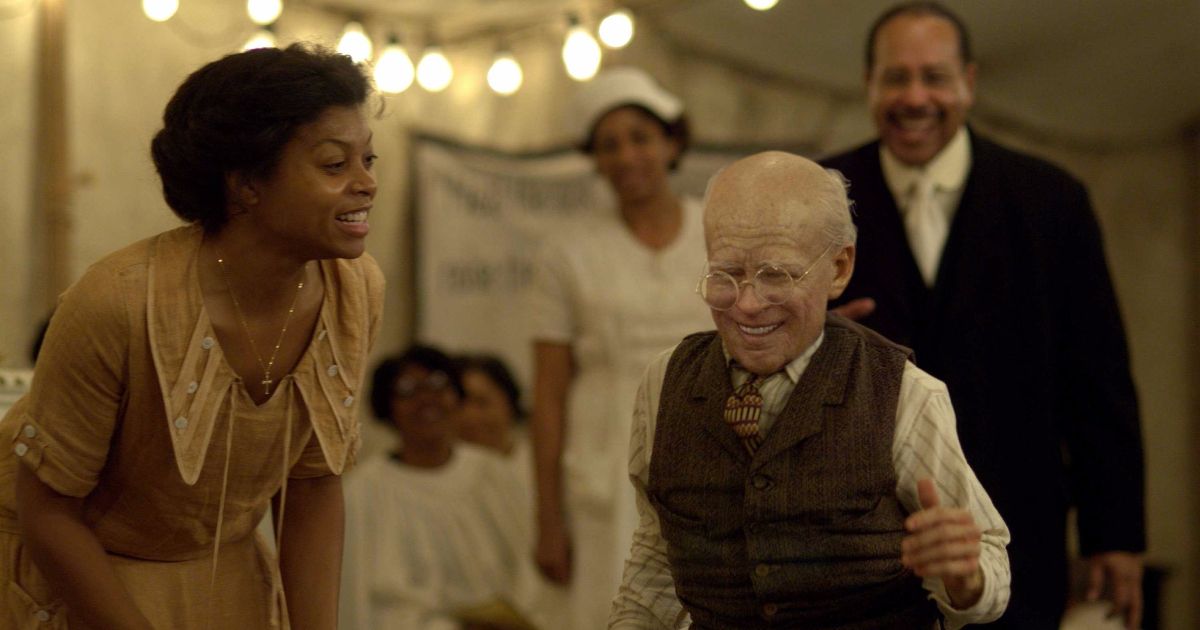 Ben smiles in a tent in The Curious Case of Benjamin Button