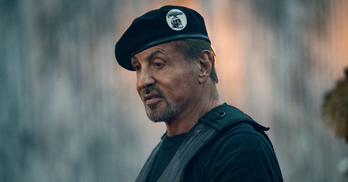 Sylvester Stallone wearing a black army beret in Expendables 4