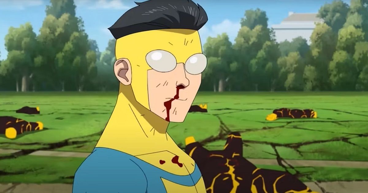 Mark Grayson wearing his Invincible costume in a field while his nose is bleeding in Invincible.