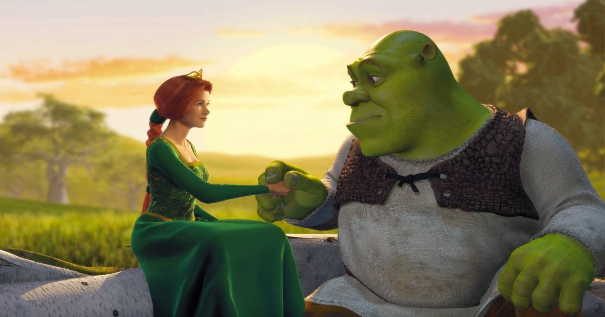 Shrek and Fiona sit by the sunset on a tree in Shrek.