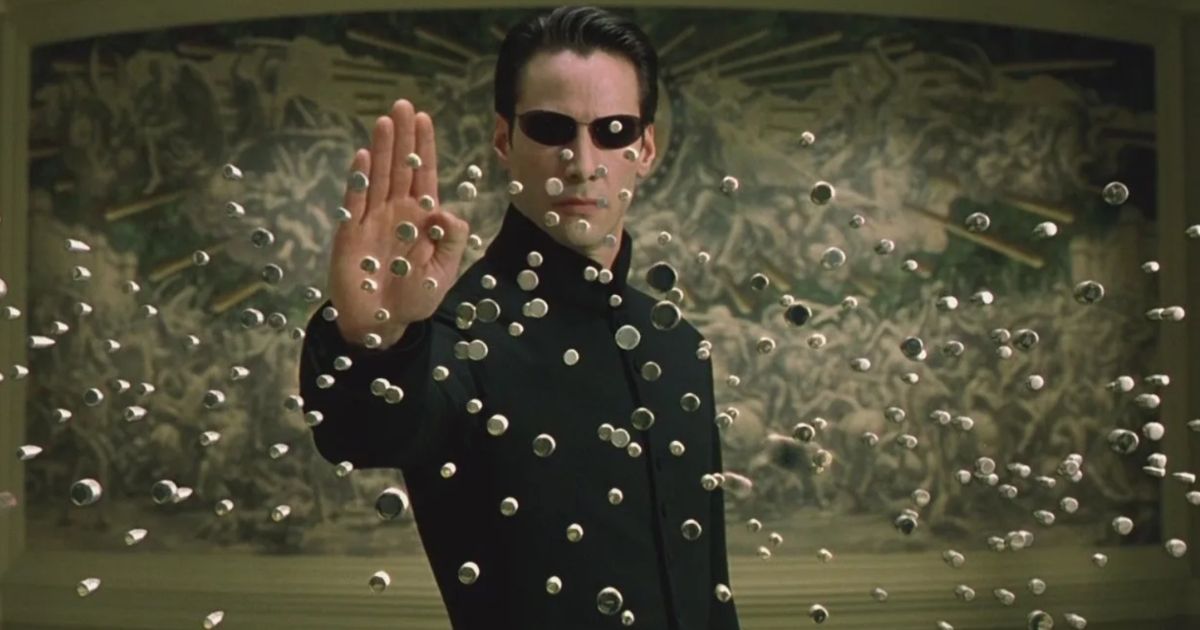 Keanu Reeves stops bullets in The Matrix (1999)