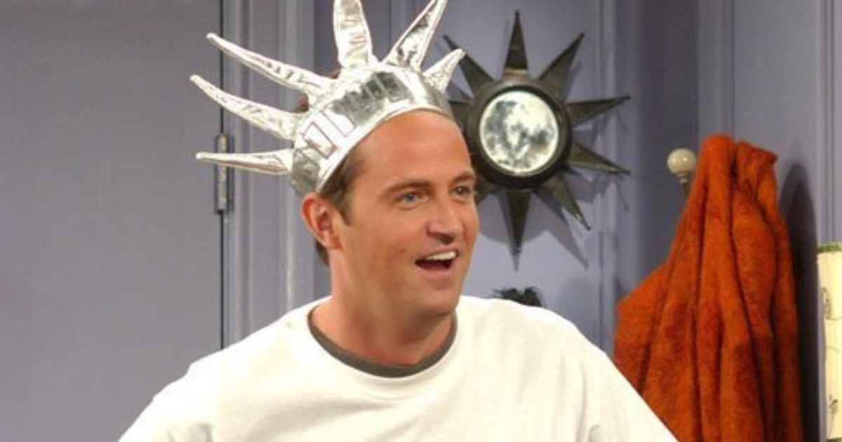 Matthew Perry as Chandler Bing wearing a Statue of Liberty costume in Friends