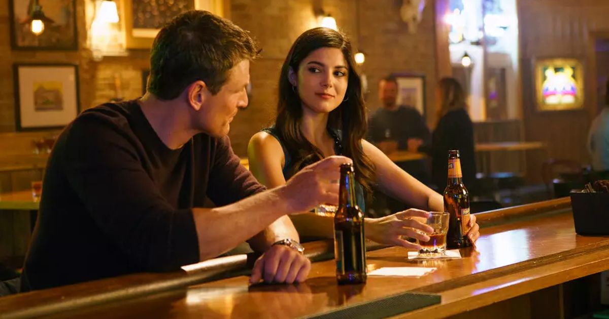 Peter and Anna sit at the bar in Chicago Justice.