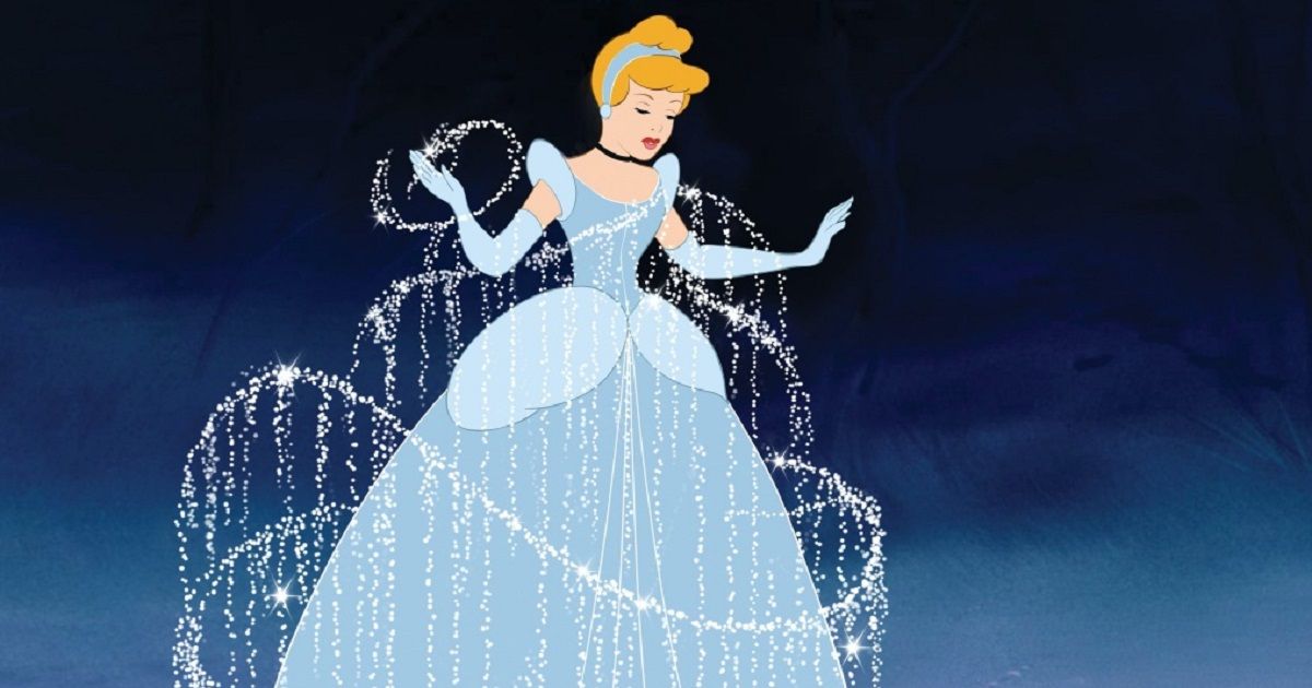 Cinderella in her blue dress, with sparkles all around her in Cinderella.