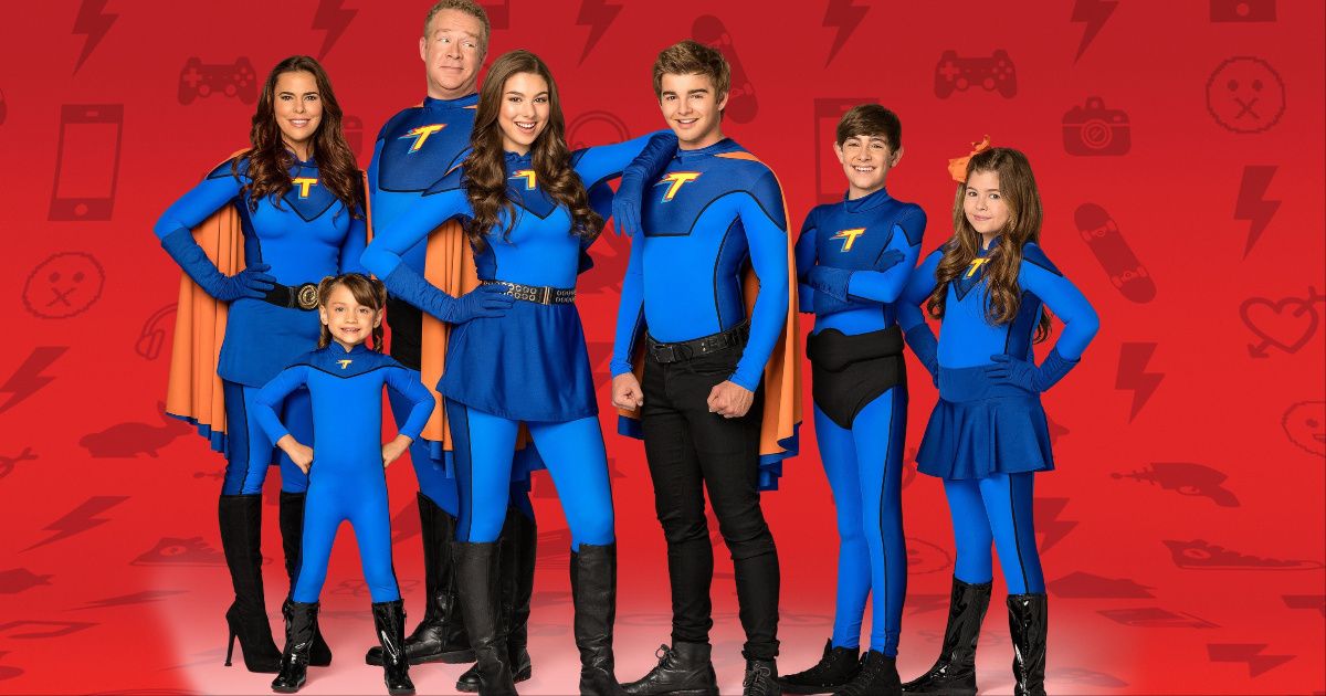 The cast of The Thundermans in their superhero costumes taking a promotional still.