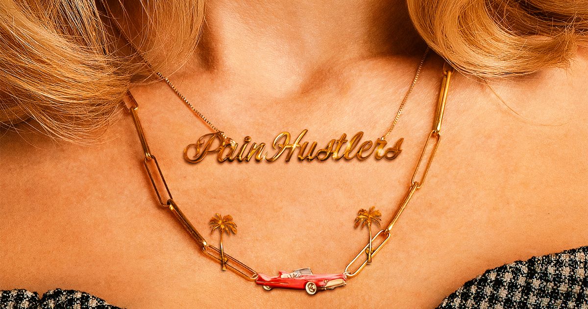 Emily Blunt necklace that reads Pain Hustlers