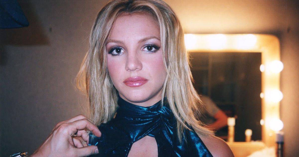 Still from the documentary Framing Britney Spears with Britney wearing a dark blue top in a dressing room.