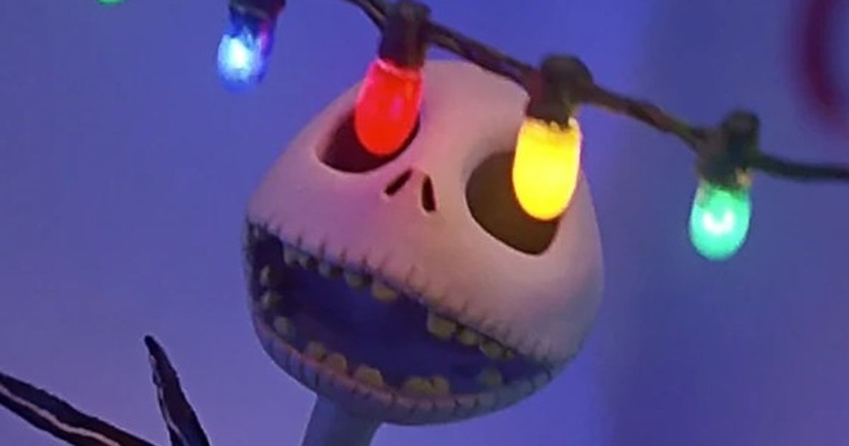 Jack Skellington in The Nightmare Before Christmas looking at Christmas lights with a smile