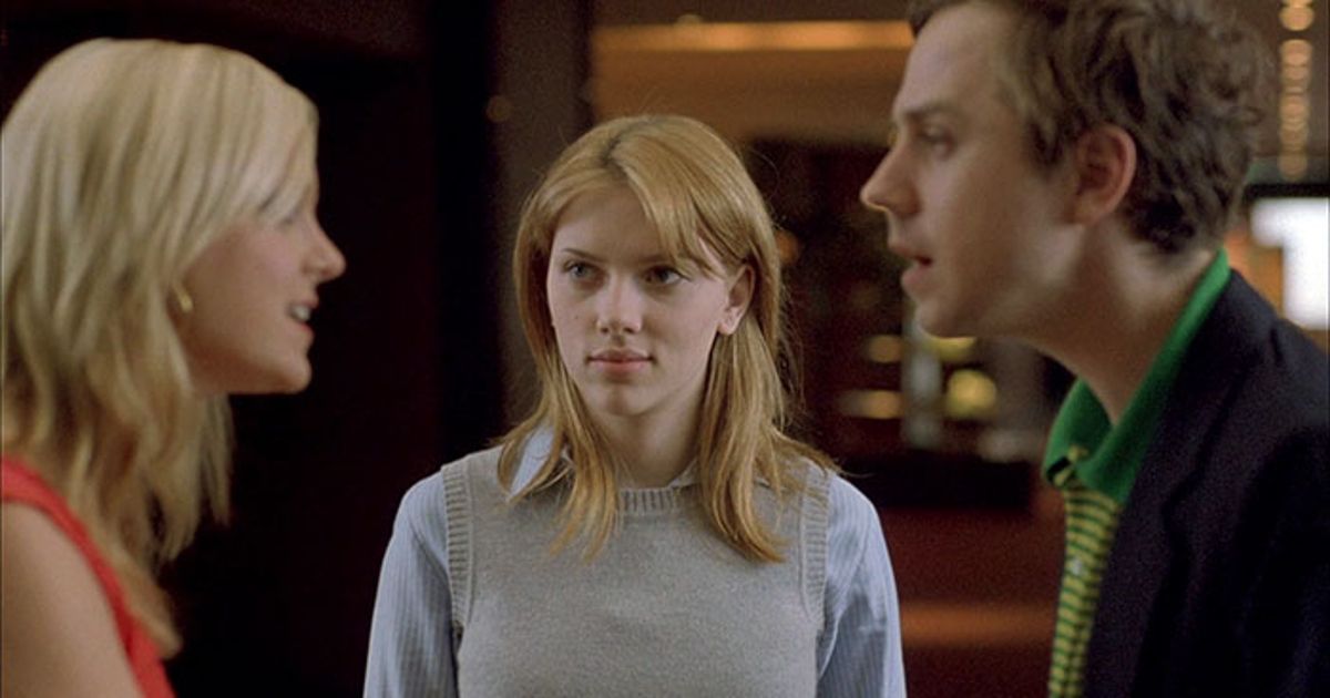 Charlotte stands between Kelly and John in Lost in Translation