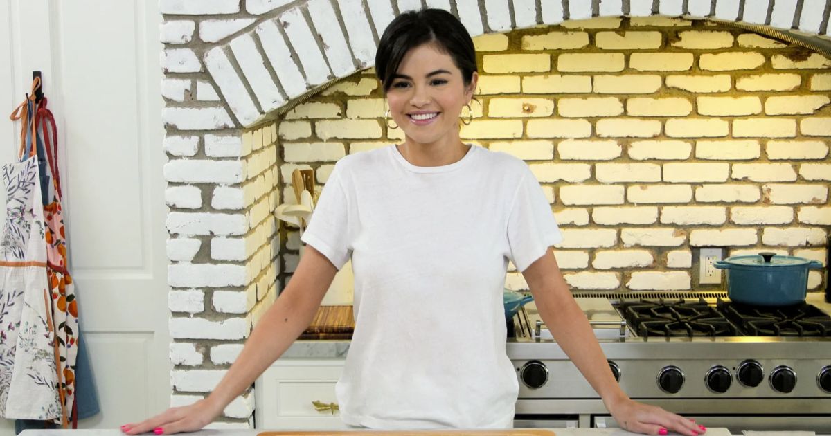 Selena Gomez prepares to cook in her kitchen for Selena + Chef.